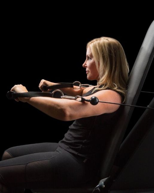 Woman working out on an ARX equipment