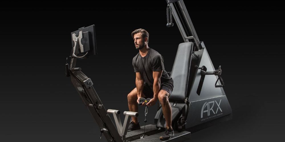Man performing a deadlift exercise on an ARX machine.